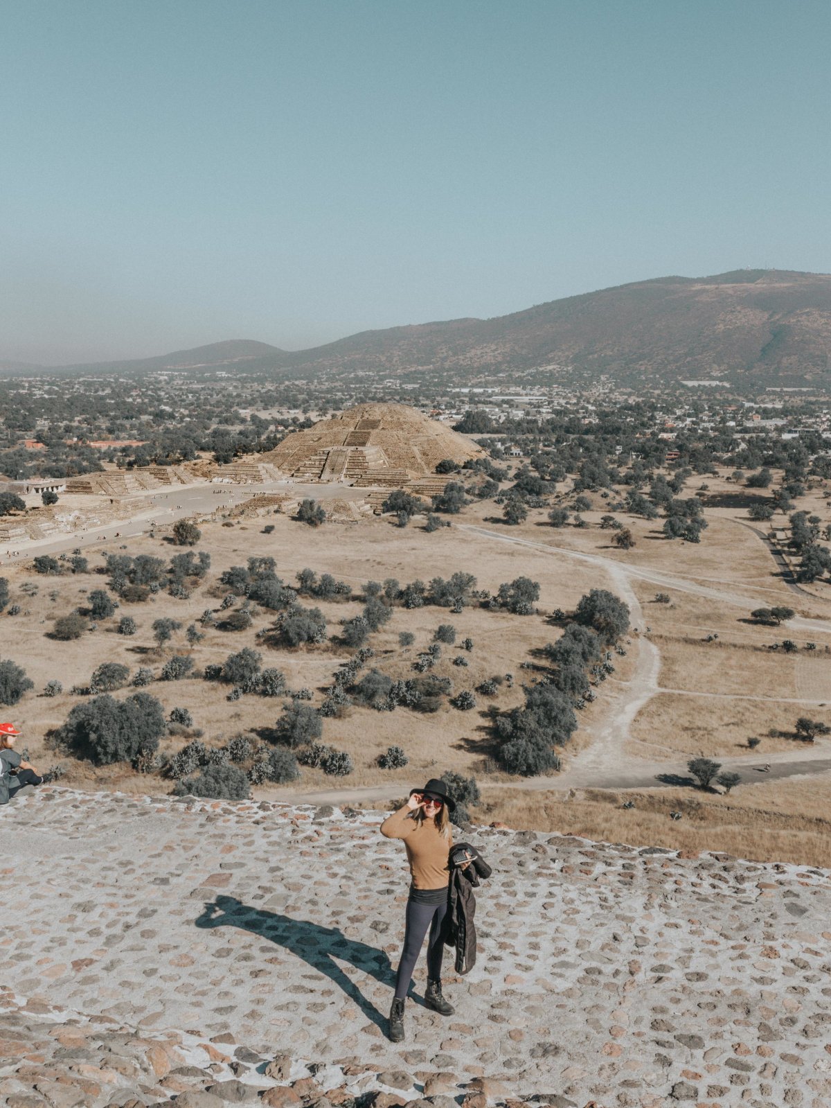  On top of the Pyramid del Sol, with the Pyramid de la Luna behind me. 