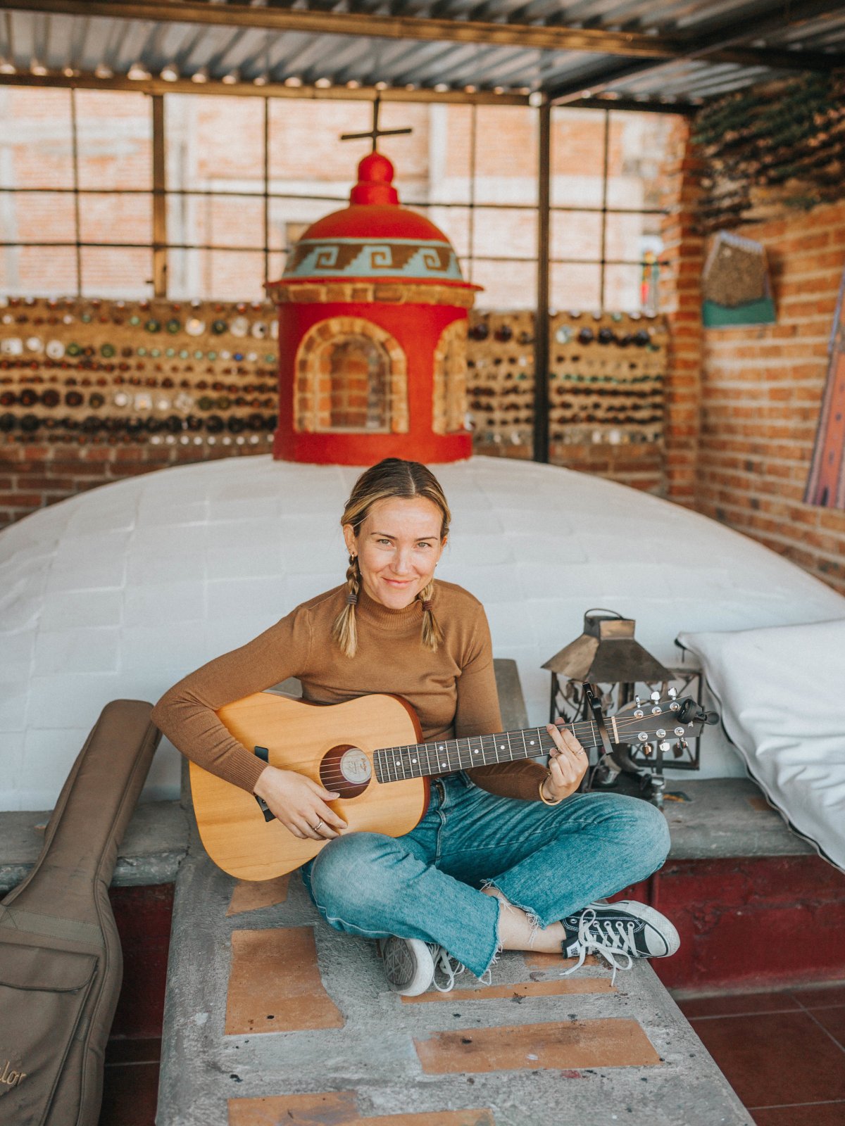 Rachel playing guitar at our hostel in Guanajuato. 